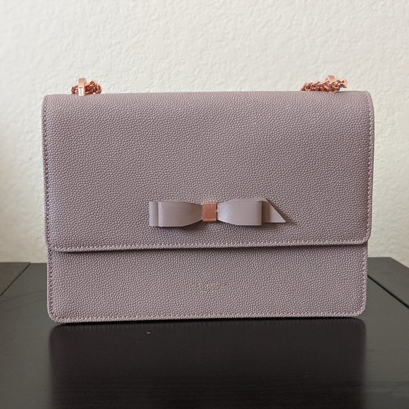 joanaa bow detail leather cross body bag